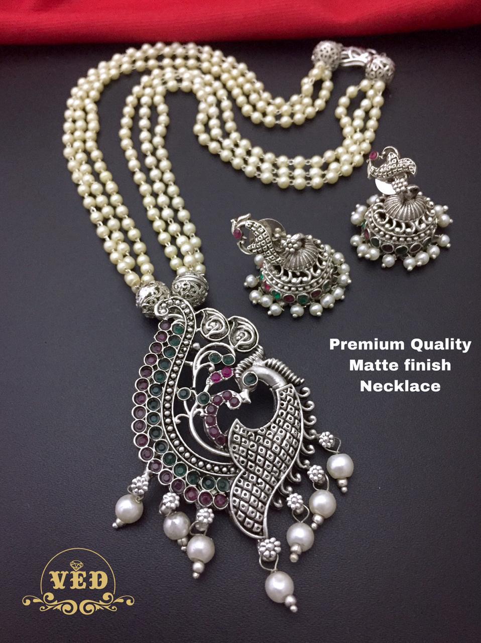 Bead Pearl Mid length Necklace with Peacock Pendant and matching Jhumka