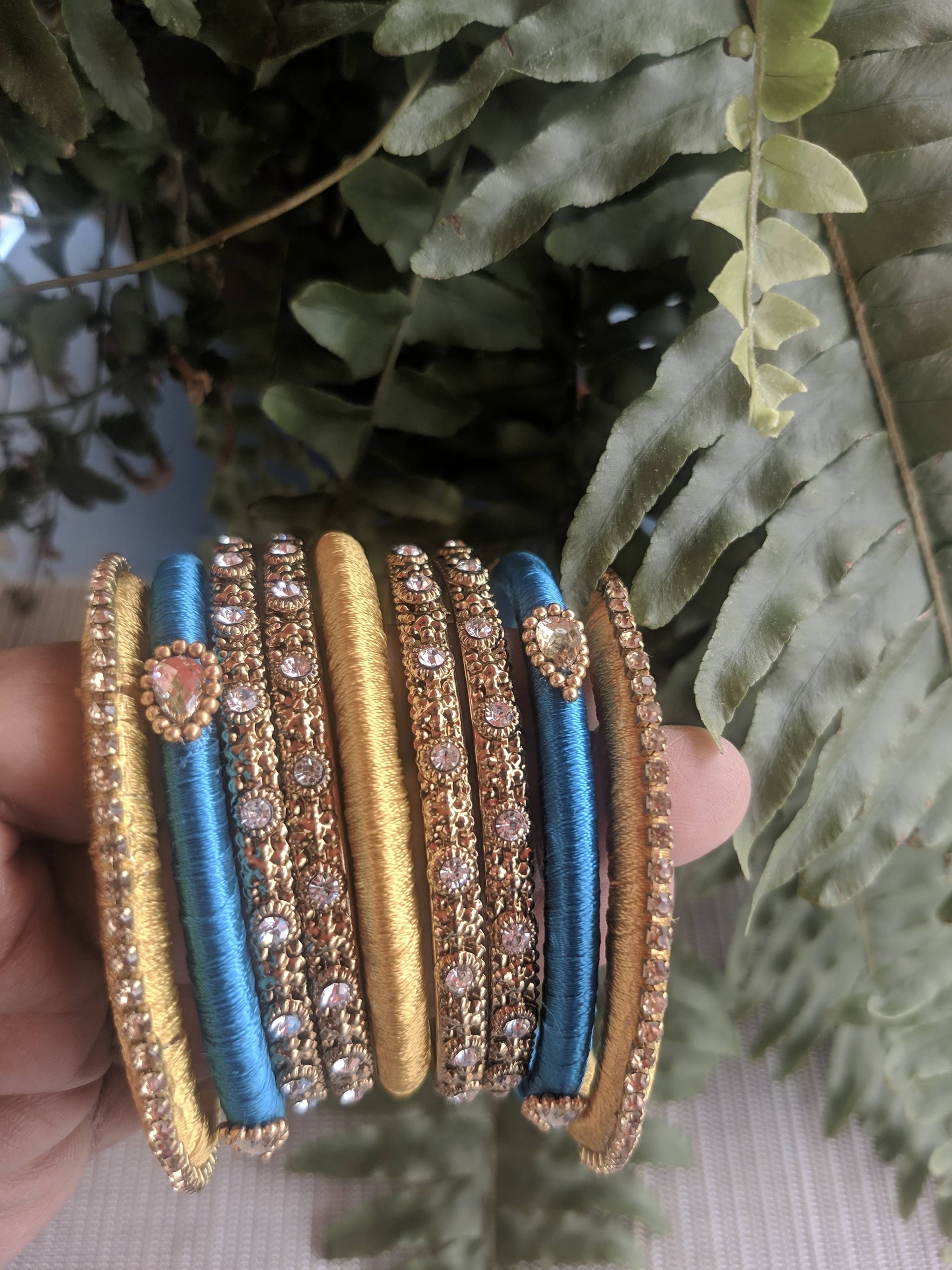 Set of 9 Blue And Yellow Silk Thread Bangles