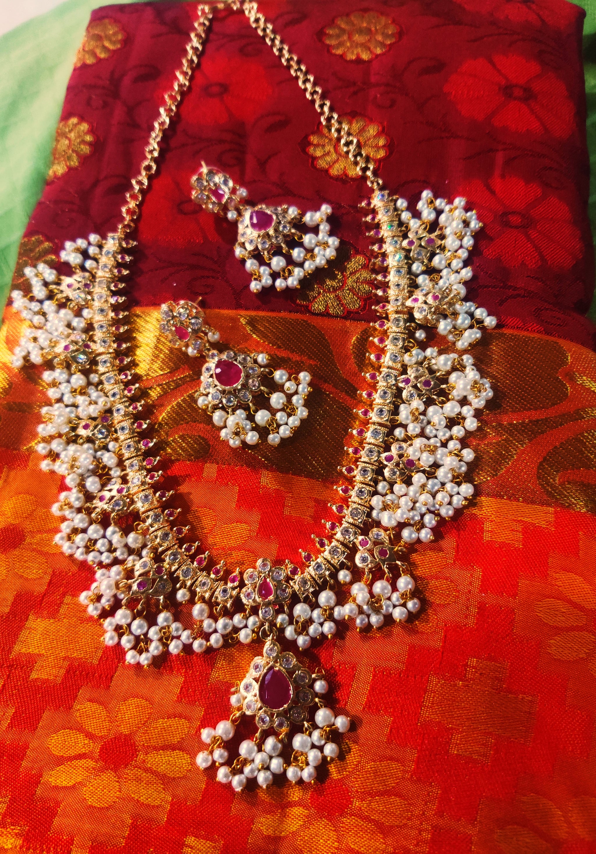 Gungru Guttupulasu Necklace with White Red AD Stones And Matching Earrings