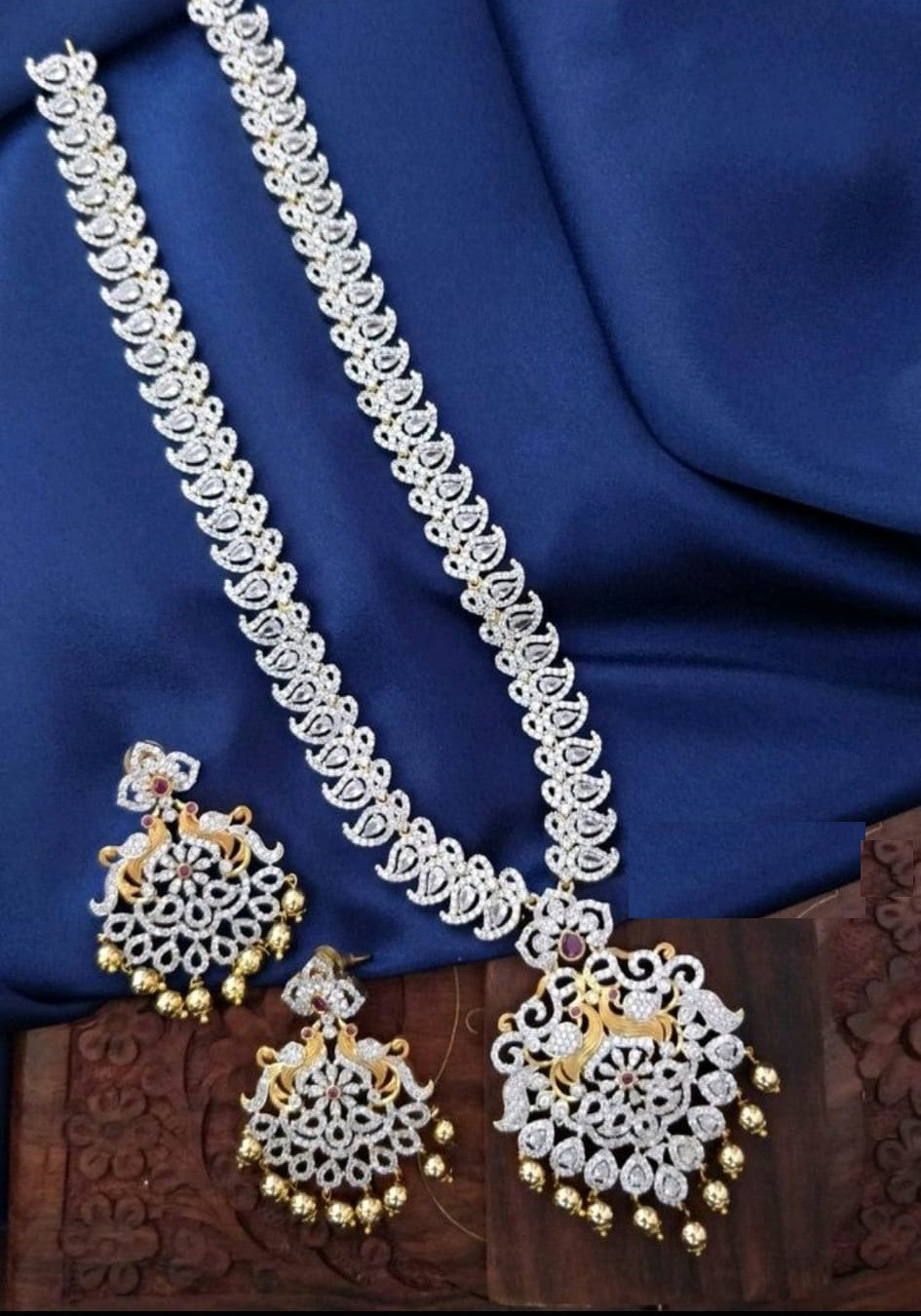 Grand Looking Long Necklace Haar Aaram With White Stones And Matching Earrings