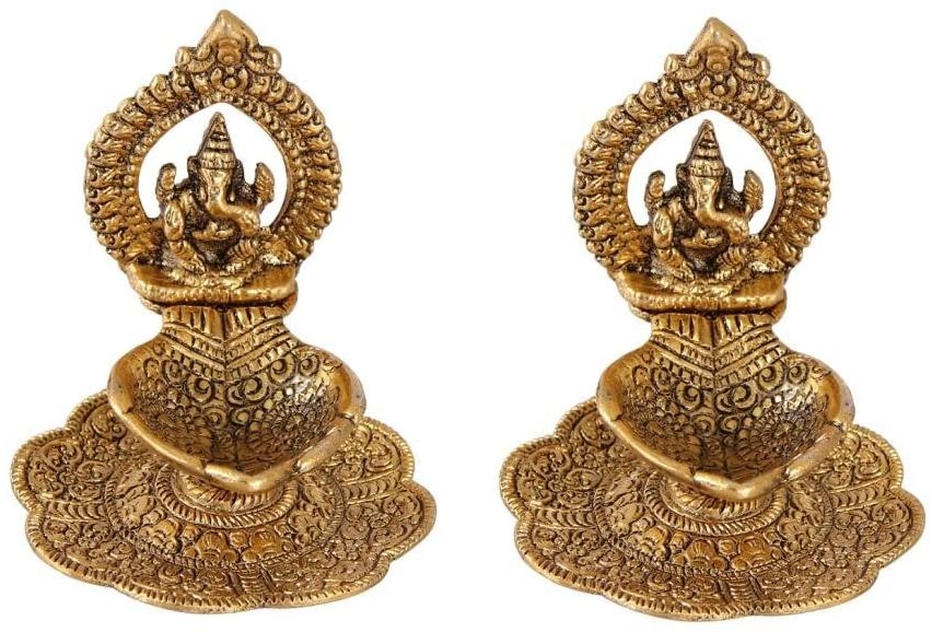 Single White Metal Golden oil lamp Diya With Ganesha Statue for puja room